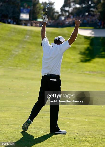 Fran Quinn pumps his fist after hitting his second shot on the 18th hole to four feet setting up a winning birdie putt during the final round of the...