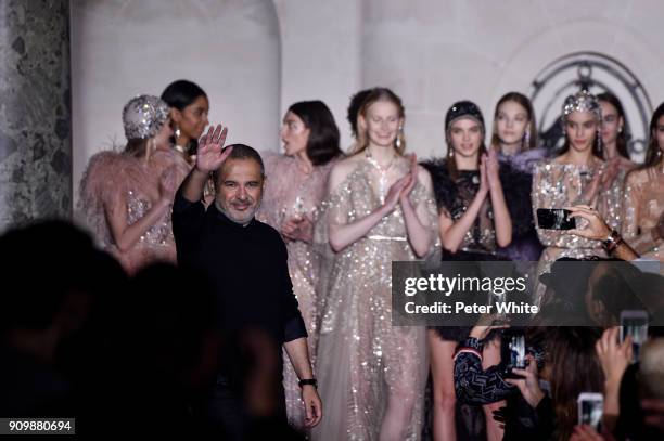 Elie Saab acknowledges the audience after the Elie Saab Spring Summer 2018 show as part of Paris Fashion Week on January 24, 2018 in Paris, France.