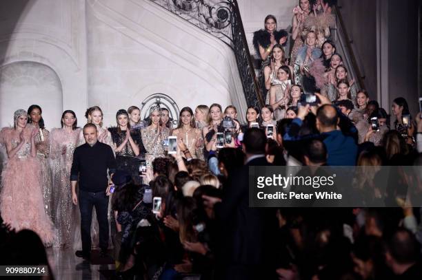 Elie Saab acknowledges the audience after the Elie Saab Spring Summer 2018 show as part of Paris Fashion Week on January 24, 2018 in Paris, France.
