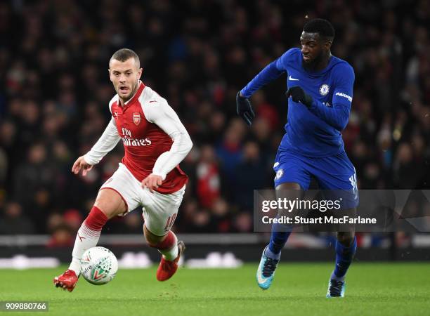 Jack Wilshere of Arsenal breaks past Tiemoue Bakayoko of Chelsea during the Carabao Cup Semi-Final Second Leg between Arsenal and Chelsea at Emirates...