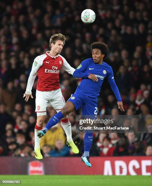Nacho Monreal of Arsenal challenges Willian of Chelsea during the Carabao Cup Semi-Final Second Leg between Arsenal and Chelsea at Emirates Stadium...