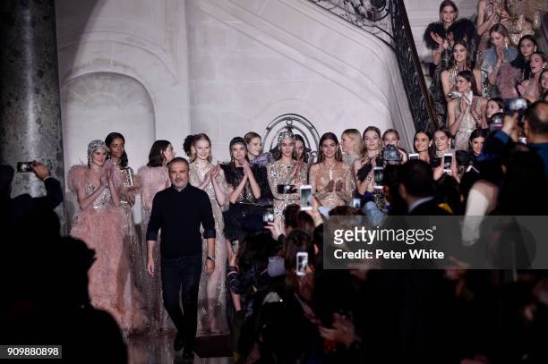 Elie Saab acknowledges the audience after the Elie Saab Spring Summer 2018 show as part of Paris Fashion Week on January 24, 2018 in Paris, France.