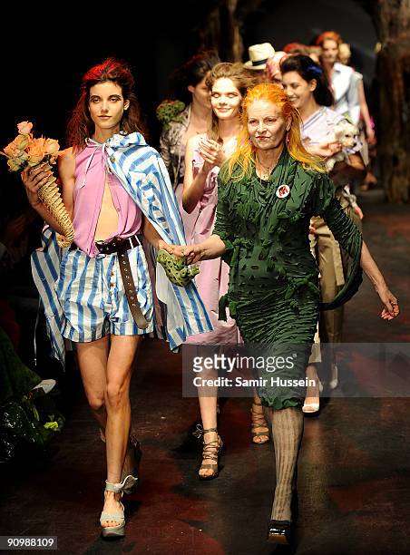 Vivienne Westwood walks the catwalk with models during the Vivienne Westwood Red Label Fashion Show during London Fashion week at the Red Bull...