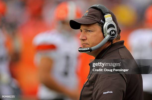 Head coach Eric Mangini of the Cleveland Browns leads his team against the Denver Broncos during NFL action at Invesco Field at Mile High on...