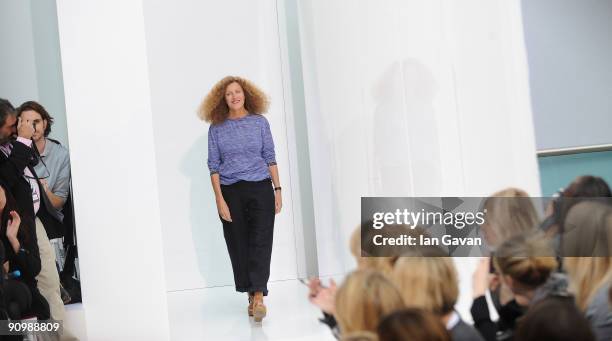 Designer Nicole Farhi appears on the catwalk after her fashion show as part of London Fashion Week at the Royal Opera House, Covent Garden, on...