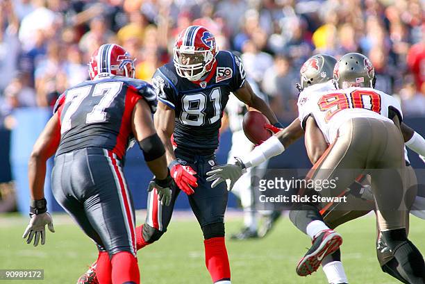 Terrell Owens of the Buffalo Bills runs on a reverse against the Tampa Bay Buccaneers at Ralph Wilson Stadium on September 20, 2009 in Orchard Park,...