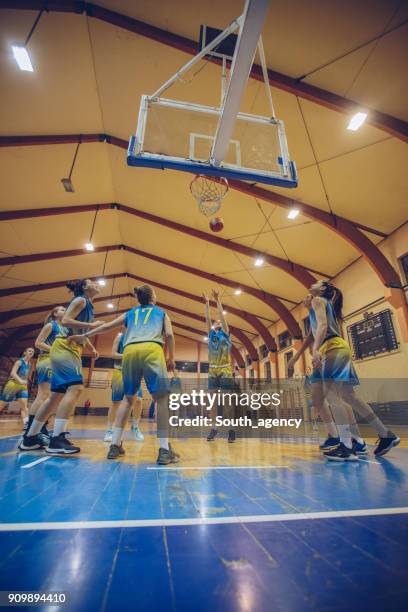 free throw shooting - female basketball team stock pictures, royalty-free photos & images