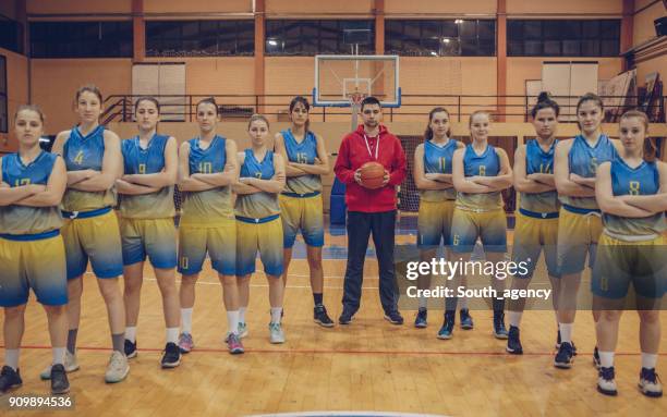 women basketball team - basketball team stock pictures, royalty-free photos & images