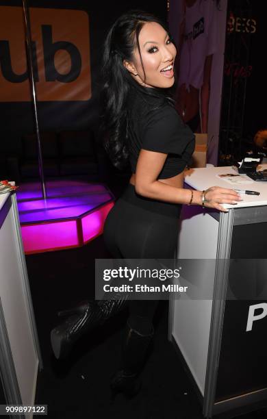 Adult film actress/director Asa Akira poses at the Pornhub booth at the 2018 AVN Adult Entertainment Expo at the Hard Rock Hotel & Casino on January...