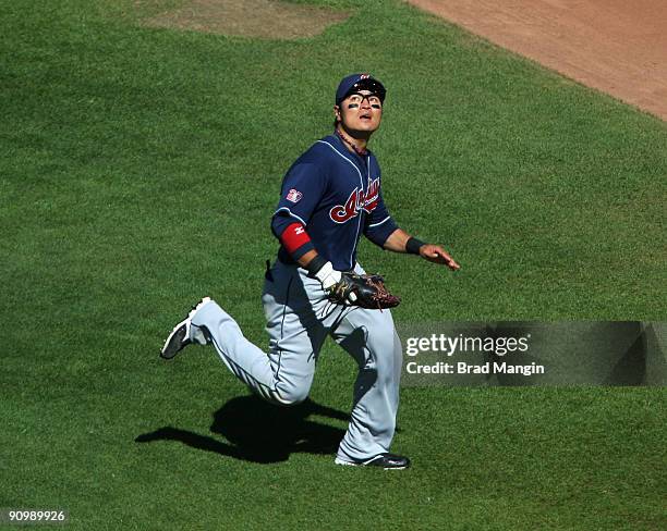 Shin-Soo Choo of the Cleveland Indians chases a fly ball in right field against the Oakland Athletics during the game at the Oakland-Alameda County...