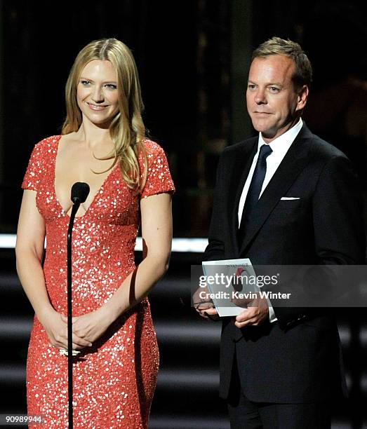 Actress Anna Torv and actor Kiefer Sutherland present the Outstanding Made For Television Movie award onstage during the 61st Primetime Emmy Awards...