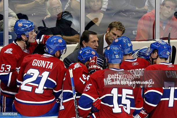 Montreal Canadiens Head Coach Jacques Martin talks to his players during a time out in their NHL Preseason game against the Boston Bruins on...