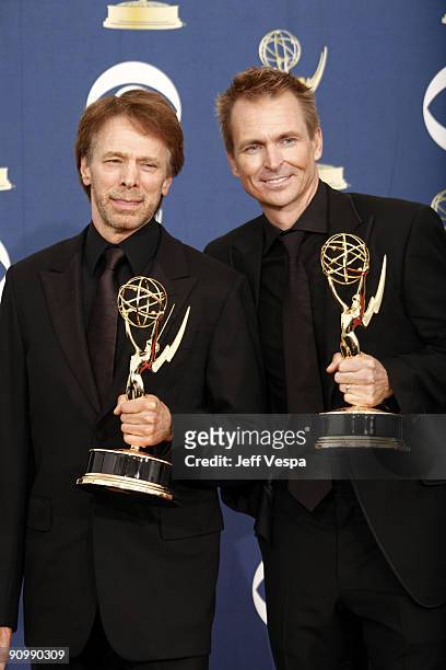 Producer Jerry Bruckheimer and Phil Keoghan pose in the press room at the 61st Primetime Emmy Awards held at the Nokia Theatre on September 20, 2009...
