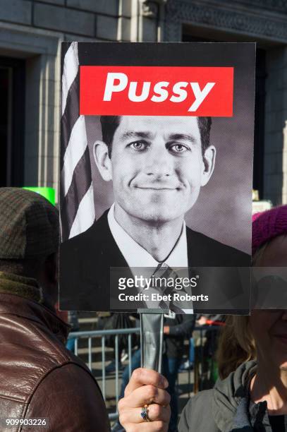 Marcher holds up a placard of Speaker of the U.S. House of Representatives, Paul Ryan, at the 2018 Women's March in New York City on January 20, 2018.