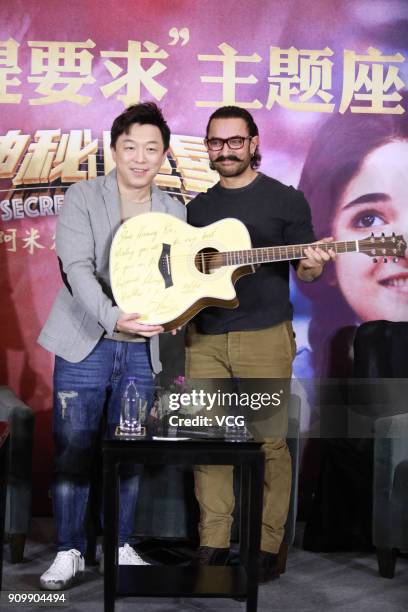 Chinese actor Huang Bo and Bollywood actor Aamir Khan attend 'Secret Superstar' press conference on January 24, 2018 in Beijing, China.