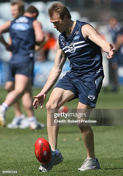 Darren Milburn of the Cats kicks the ball during a Geelong Cats AFL training session at Skilled Stadium September 21, 2009 in Melbourne, Australia.