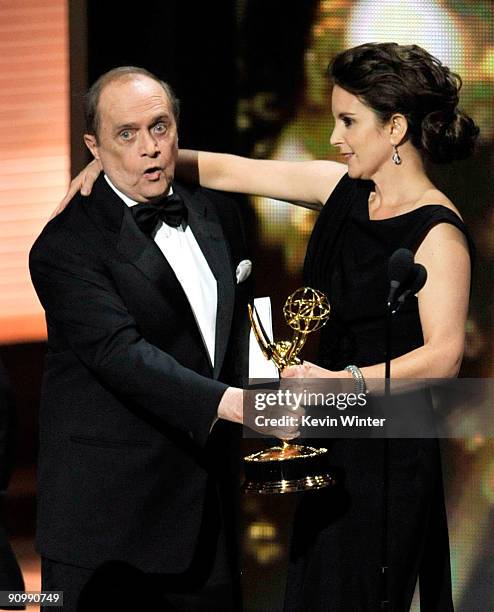 Actor Bob Newhart presents the Outstanding Comedy Series award to actress Tina Fey for "30 Rock" onstage during the 61st Primetime Emmy Awards held...