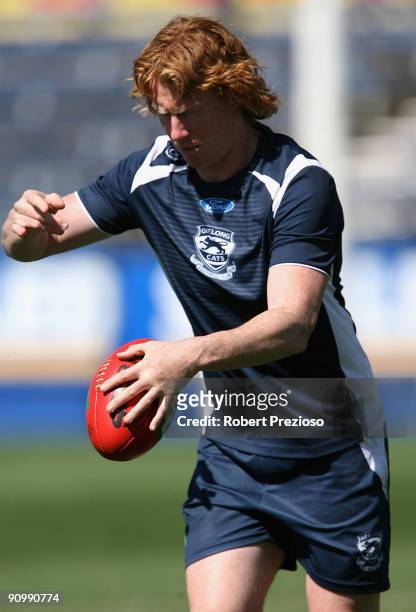 Cameron Ling of the Cats kicks the ball during a Geelong Cats AFL training session at Skilled Stadium September 21, 2009 in Melbourne, Australia.