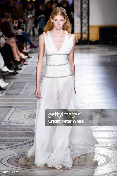 Eliza Kallmann walks the runway during the Giambattista Valli Spring Summer 2018 show as part of Paris Fashion Week on January 22, 2018 in Paris,...