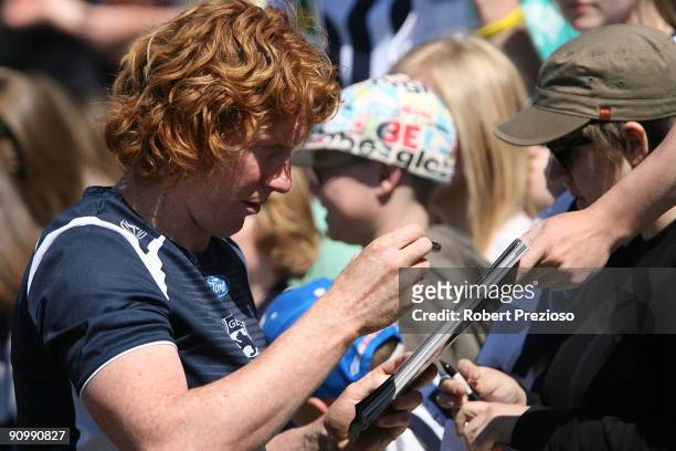 Cameron Ling of the Cats signs autographs during a Geelong Cats AFL training session at Skilled Stadium September 21, 2009 in Melbourne, Australia.