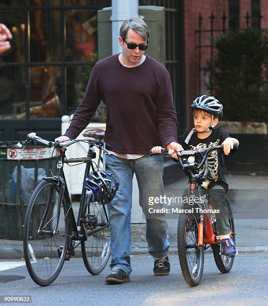 Matthew Broderick and son James Broderick are seen riding their bicycles on the streets of Manhattan on September 20, 2009 in New York, New York.