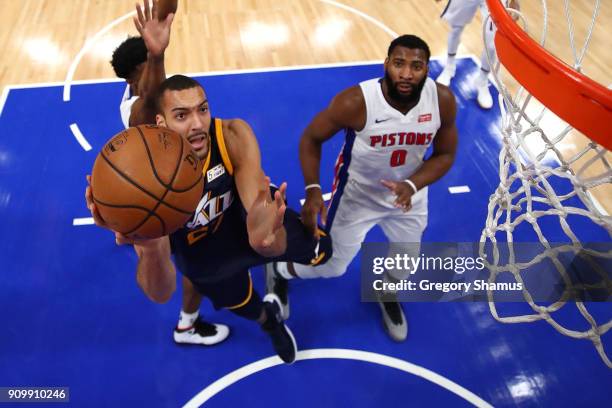 Rudy Gobert of the Utah Jazz gets to the basket past Andre Drummond of the Detroit Pistons during the second half at Little Caesars Arena on January...