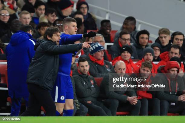 Antonio Conte manager of Chelsea speaks to Ross Barkley as he prepares to come on as a substitute and make his debut during the Carabao Cup...