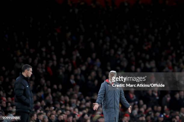 Arsene Wenger manager of Arsenal shouts at 4th official Andre Marriner during the Carabao Cup Semi-Final 2nd leg match between Arsenal and Chelsea at...