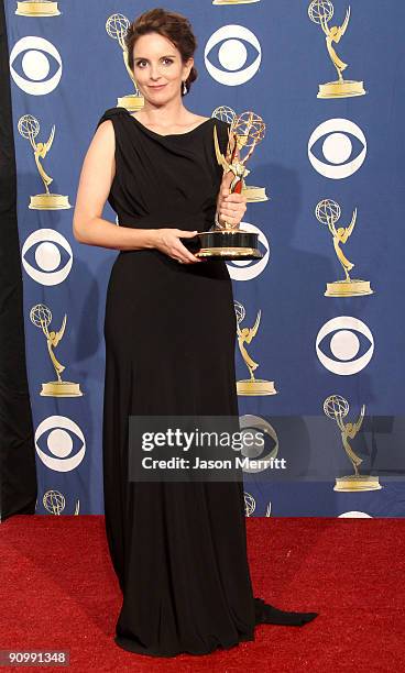 Actress/executive producer Tina Fey poses in the press room with her Emmy for Outstanding Comedy Series for "30 Rock" at the 61st Primetime Emmy...