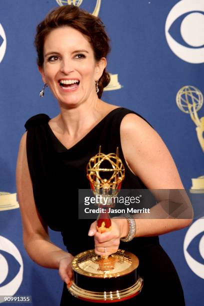 Actress/executive producer Tina Fey poses in the press room with her Emmy for Outstanding Comedy Series for "30 Rock" at the 61st Primetime Emmy...