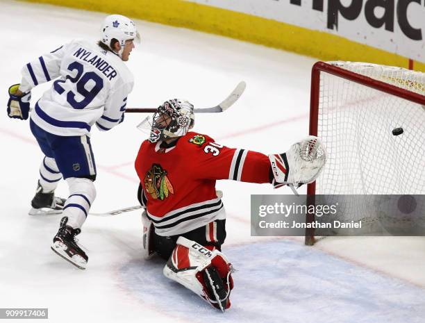 William Nylander of the Toronto Maple Leafs scores the game winning goal against Jeff Glass of the Chicago Blackhawks on a penalty shot at the United...