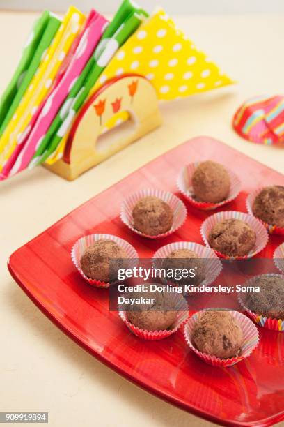 almond chocolate balls - napkin holder stock pictures, royalty-free photos & images