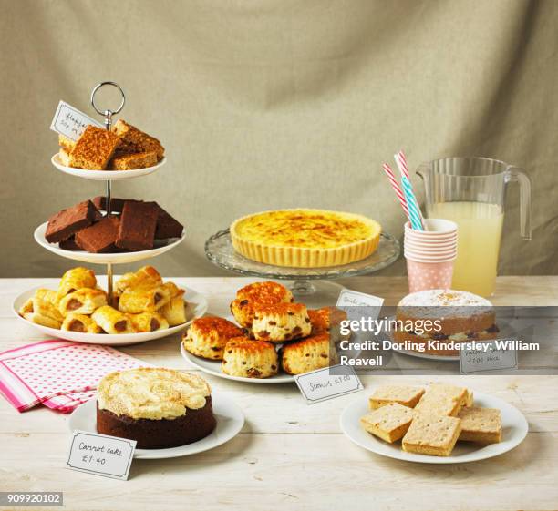 goods for sale at a village fair - dessert stand stock pictures, royalty-free photos & images