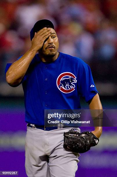 Starting pitcher Carlos Zambrano of the Chicago Cubs reacts to givingup a run against the St. Louis Cardinals on September 20, 2009 at Busch Stadium...