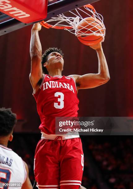 Justin Smith of the Indiana Hoosiers dunks the ball against the Illinois Fighting Illini at State Farm Center on January 24, 2018 in Champaign,...