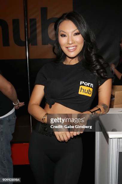 Adult film actress/director Asa Akira poses at the Pornhub booth during the 2018 AVN Adult Expo at the Hard Rock Hotel & Casino on January 24, 2018...