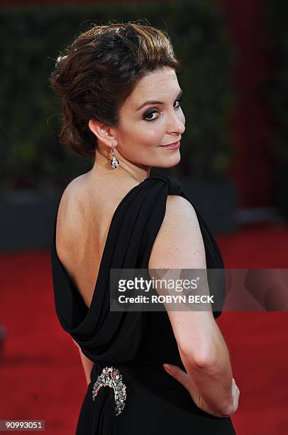 Actress Tina Fey arrives on the red carpet for the 2009 Emmy Awards at the Nokia Theater in Los Angeles on September 20, 2009. Period drama "Mad Men"...