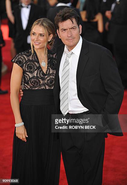 Actor Charlie Sheen and wife Brooke Allen arrive on the red carpet for the 2009 Emmy Awards at the Nokia Theater in Los Angeles on September 20,...