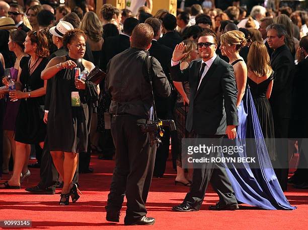 British actor Ricky Gervais arrives on the red carpet for the 2009 Emmy Awards at the Nokia Theater in Los Angeles on September 20, 2009. Period...