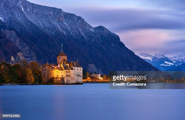 chateau de chillon at dusk, geneva lake, montreux, switzerland - chillon stock pictures, royalty-free photos & images