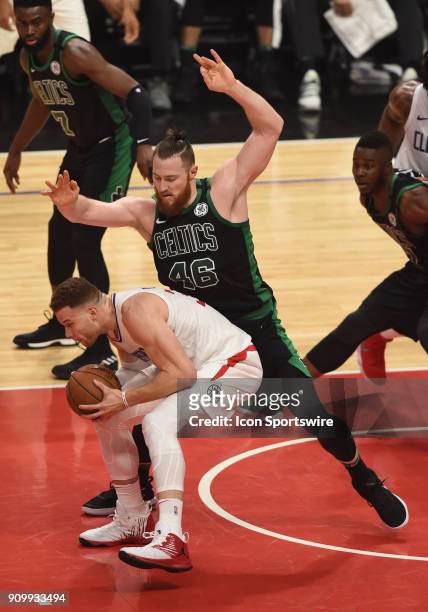Boston Celtics Center Aron Baynes guards Los Angeles Clippers Forward Blake Griffin during an NBA game between the Boston Celtics and the Los Angeles...