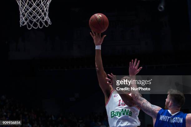 Munich's Reggie Redding and Zenit's Shayne Whittington vies for the ball during the EuroCup Round 4 Top 16 basketball match between Zenit and Bayern...