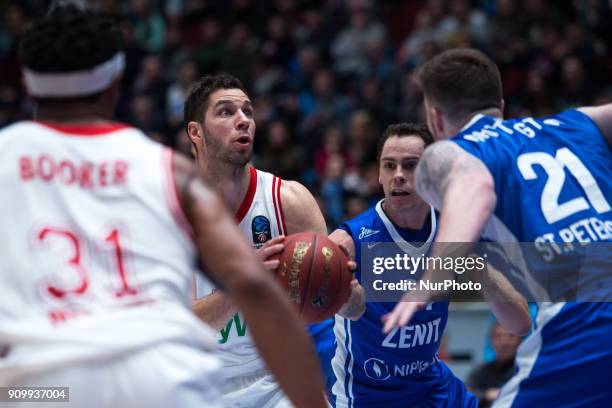 Munich's Stefan Jovic and Zenit's Kyle Kuric vies for the ball during the EuroCup Round 4 Top 16 basketball match between Zenit and Bayern Munich at...