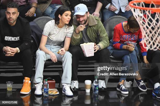 Model Kendall Jenner and producer Michael D. Ratner attend a basketball game between the Los Angeles Clippers and the Boston Celtics at Staples...