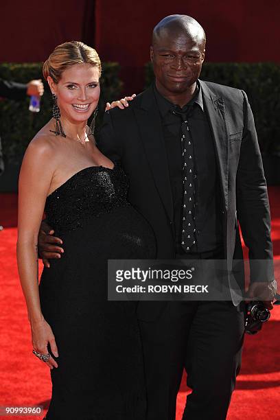 Supermodel and TV host Heidi Klum and singer Seal arrive on the red carpet for the 2009 Emmy Awards at the Nokia Theater in Los Angeles on September...