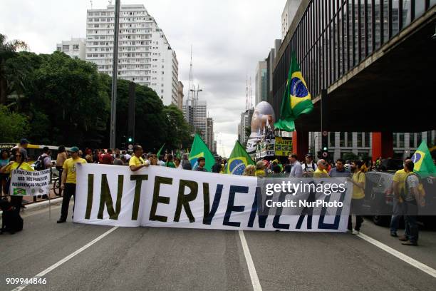 Protesters call for the conviction and arrest of former President Luiz Inacio Lula da Silva in a protest held in front of the São Paulo Museum of Art...