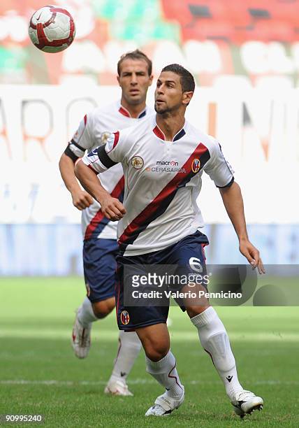 Miguel Britos of Bologna FC in action during the Serie A match between AC Milan and Bologna FC at Stadio Giuseppe Meazza on September 20, 2009 in...