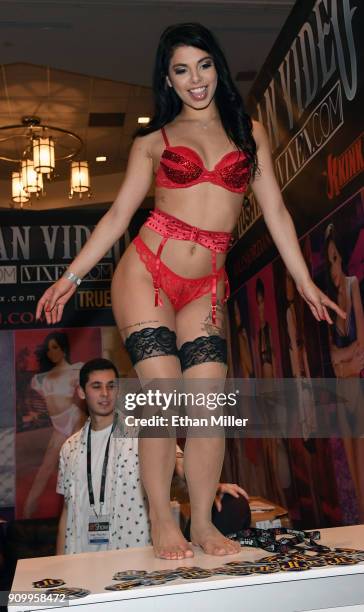 Adult film actress Gina Valentina dances at the Jules Jordan Video booth at the 2018 AVN Adult Entertainment Expo at the Hard Rock Hotel & Casino on...