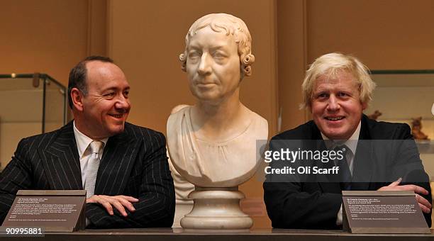 Mayor of London, Boris Johnson and Artistic Director of the Old Vic, Kevin Spacey pose for photographs in the Victoria and Albert Museum on September...