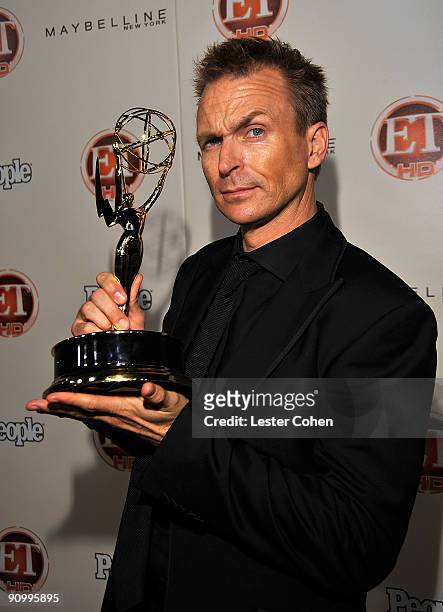 Host Phil Keoghan pposes with his Emmy for Outstanding Reality-Competition Program for 'The Amazing Race' at the 13th Annual Entertainment Tonight...